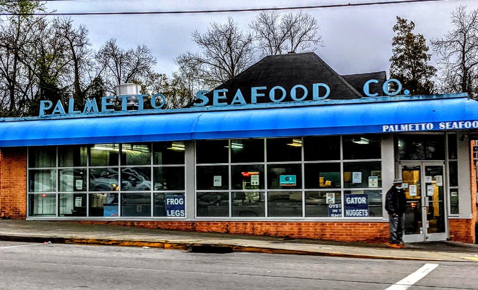 Seafood counter inside a historic market.