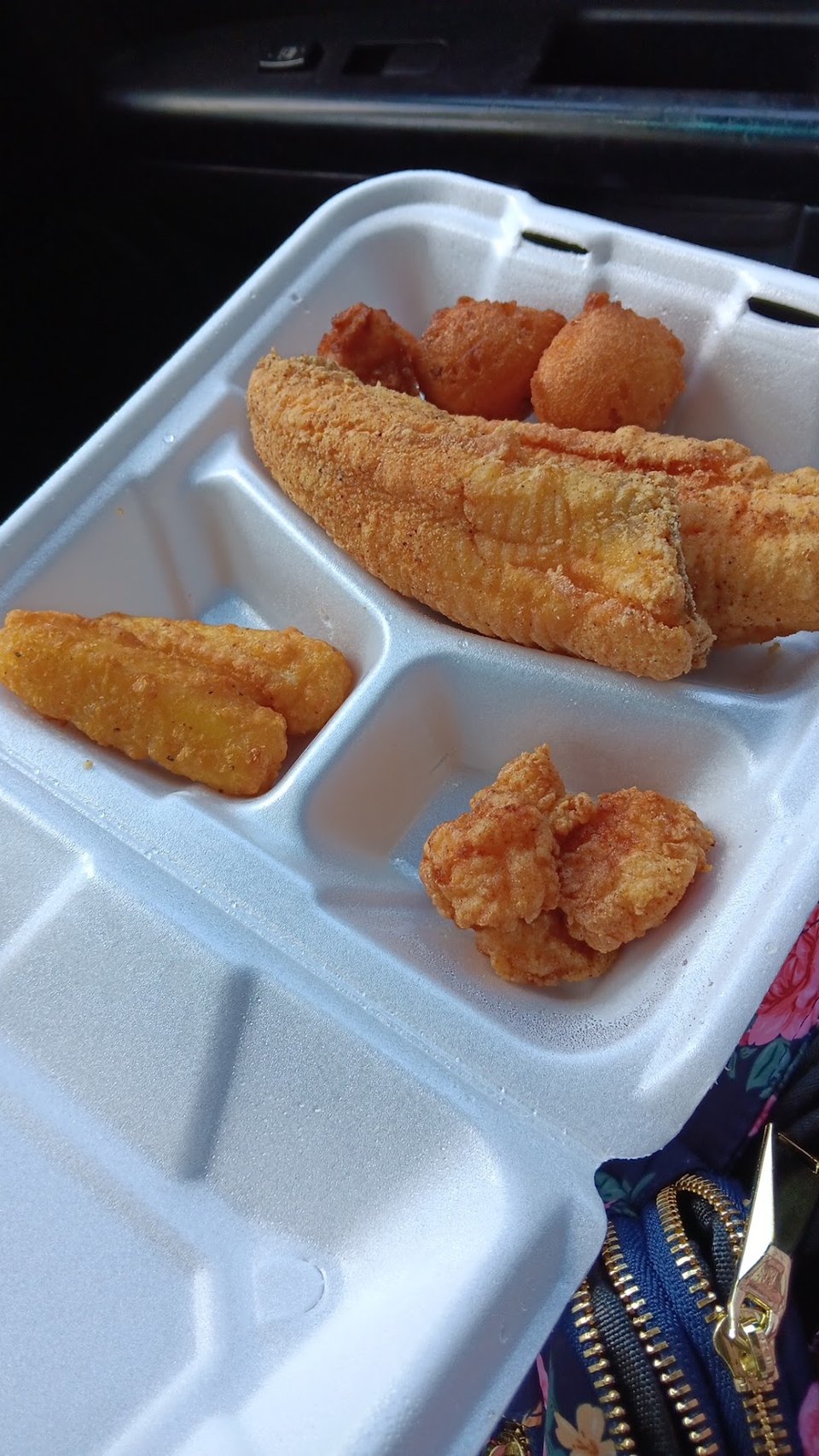 Seafood menu with fried fish combinations.