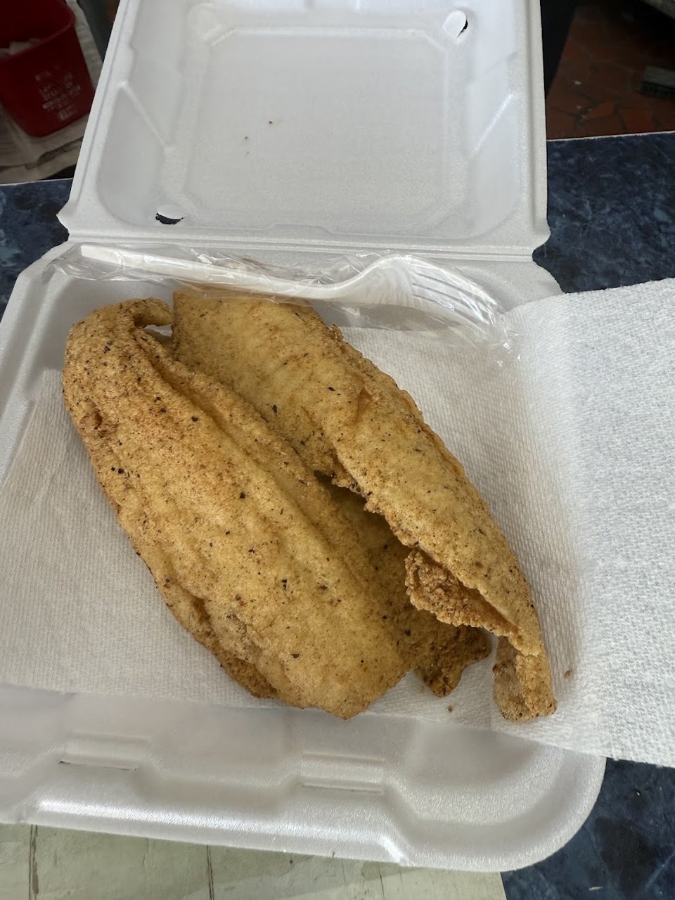 Simple menu showing takeout fish plates.