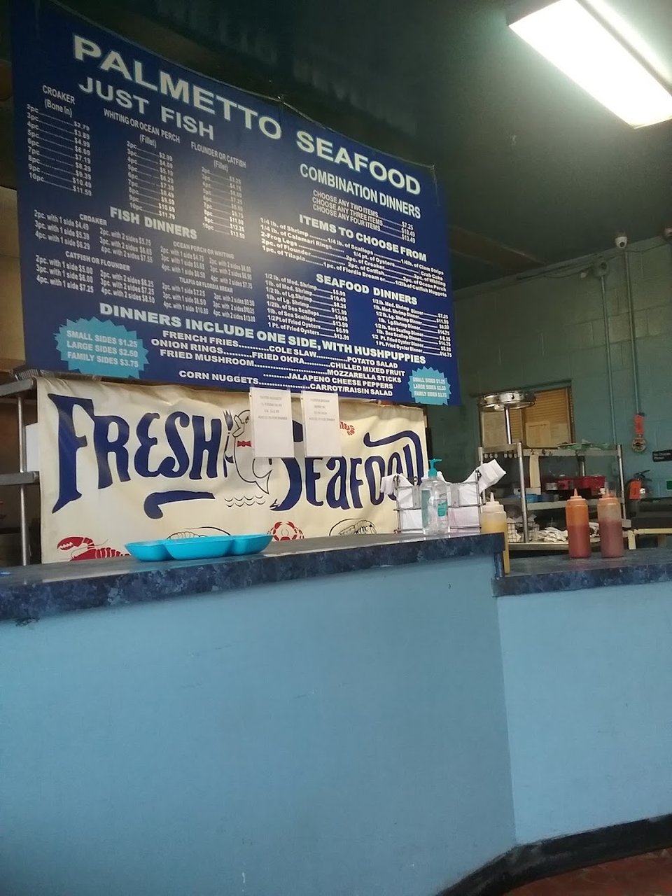 Seafood menu with fried fish combinations.